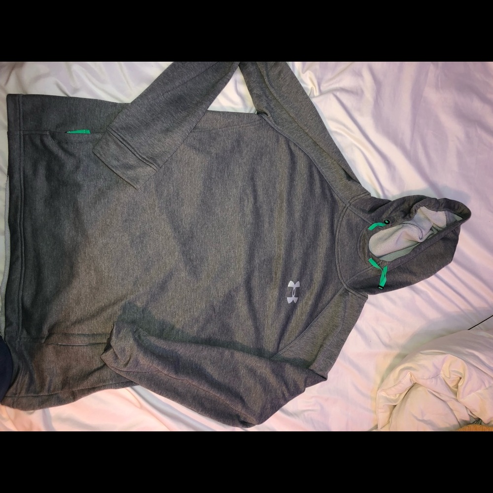Gray under armor hoodie with green accents